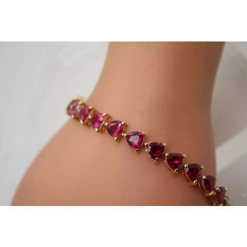 Signed UTC gold over .925 S.S. TRILLION CUT PINK SAPPHIRE bracelet 8
