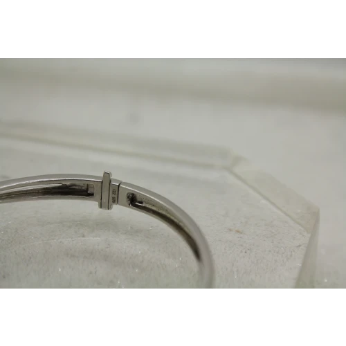 Signed ZEI .925 S.S. DIAMOND CROSSOVER DIAMOND IN MOTION bangle