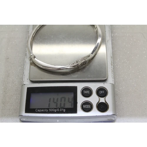 Signed ZEI .925 S.S. DIAMOND CROSSOVER DIAMOND IN MOTION bangle