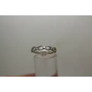 14k W.G. .24ctw DIAMOND BRAIDED DESIGNE BAND ring size 6.5