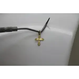 Signed OR 14k Y.G. PETITE LASER CUT CROSS pendant