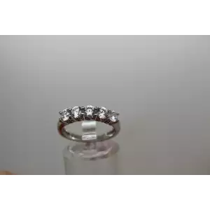 .925 S.S. SUPER SPARKLY CZ 5 STONE BAND ring size 7