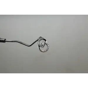 KAY JEWELERS 10k W.G. 1/3ctw DIAMOND ENCIRCLED by LOVE pendant