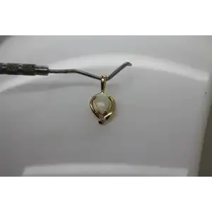 Signed 14k Y.G. Pear Cut OPAL & DIAMOND accent LEAF DESIGN pendant