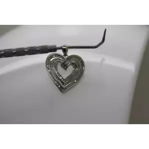 Signed .925 S.S. 1.00ctw DOUBLE ROW DIAMOND SWIRL HEART pendant