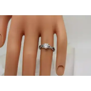 .925 S.S. Round Cut CLEAR CZ SOLITAIRE w/acc. BRAIDED ring size 5.5