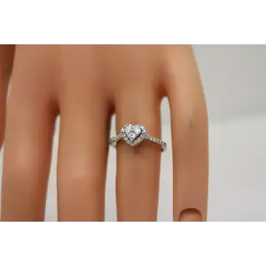 10k W.G. .33ctw DIAMOND ILLUSION HALO ring size 8