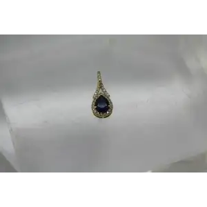 Signed ROYAL 14k Y.G. BLUE SAPPHIRE & DIAMOND HALO pendant #