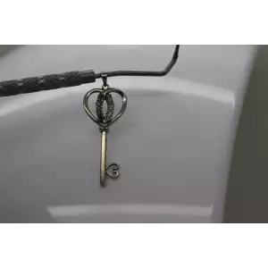 Signed R.L. .925 S.S. BLUE & WHITE DIAMOND HEART KEY pendant