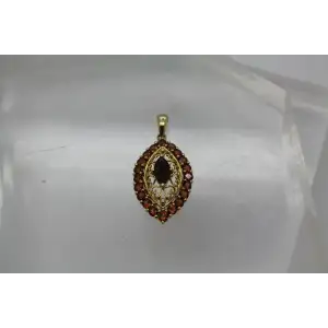 Signed 14k Y.G. GARNET FILIGREE HALO pendant #