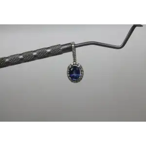 Signed 10k W.G. BLUE SAPPHIRE & .25ctw DIAMOND HALO pendant #