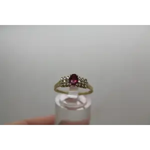 Signed 14k Y.G. Oval Cut RUBY & .18ctw DIAMOND ring size 8.75