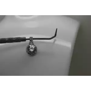 Signed SUN .925 S.S. WHITE TOPAZ SOLITAIRE HALO pendant