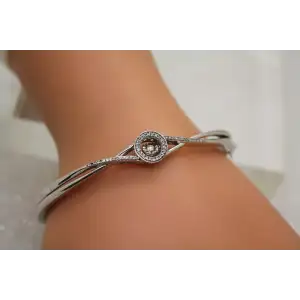 Signed ZEI .925 S.S. DIAMOND CROSSOVER DIAMOND IN MOTION bangle