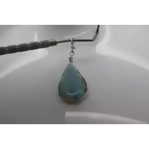 .925 S.S. SOUTHWESTERN STYLE TEARDROP CUT LARIMAR pendant