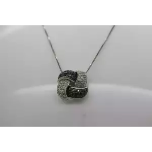 Signed SUN .925 S.S. BLACK & WHITE DIAMOND KNOT DESIGN necklace 18