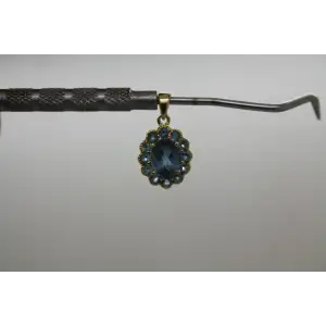 Signed DDB 10k Y.G. LONDON BLUE TOPAZ HALO pendant