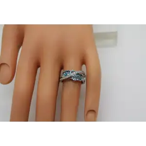 Signed .925 S.S. Shades of Blue BLUE TOPAZ CROSSOVER ring size. 6.75 #
