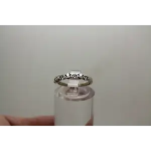 Signed 10k W.G. .20ctw DIAMOND WAVE DESIGN BAND ring size 4