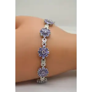 STS CHUCK CLEMENCY .925 S.S. TANZANITE FLOWER INFINITY bracelet
