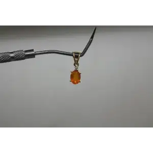 Signed STS 14k Y.G. ORANGE STONE w/ accent DIAMOND OVAL pendant