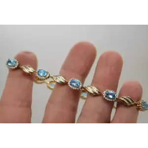 Signed SUN gold over .925 S.S. BLUE TOPAZ DIAMOND FANCY link bracelet