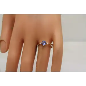 14k Y.G. .50ct TANZANITE SOLITAIRE w/ Diamond Acc. ring size 9.75
