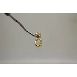 14k Y.G. Oval Cut OPAL & .15ct DIAMOND DROP pendant