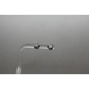 Signed 14k W.G. .60ctw DIAMOND FANCY STUD earrings