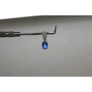 Signed 14k W.G. BLUE TOPAZ & WHITE SAPPHIRE OVAL DROP pendant