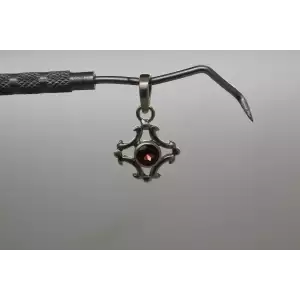 Vtg. .925 S.S. GARNET OPEN WORK CROSS DESIGN pendant