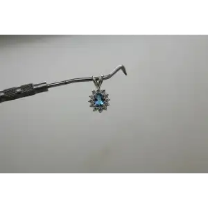 14k W.G. Oval Cut BLUE TOPAZ & WHITE SAPPHIRE HALO pendant