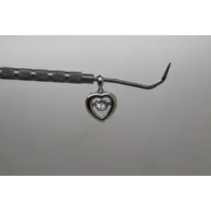 Signed JH .925 S.S. RHYTHM CZ HEART pendant with Scroll Work