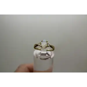 Signed 14k Y.G. Oval Cut OPAL & DIAMOND ring size 5.75