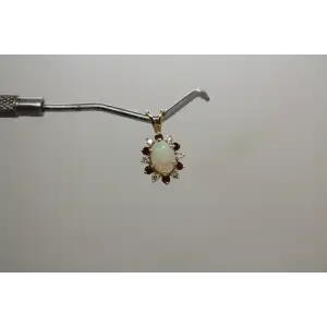 14k Yellow Gold OPAL, RUBY & DIAMOND HALO pendant