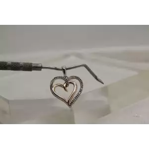 Signed SUN .925 S.S. DIAMOND TWO TONE DOUBLE HEART pendant