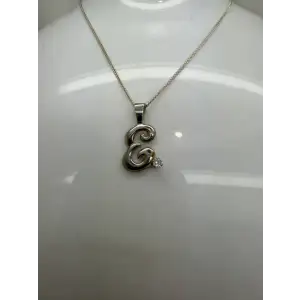 Signed .925 S.S. FANCY INITAL E CZ pendant necklace.
