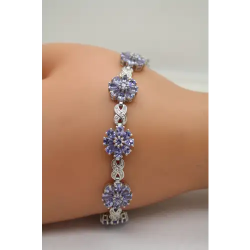 STS CHUCK CLEMENCY .925 S.S. TANZANITE FLOWER INFINITY bracelet