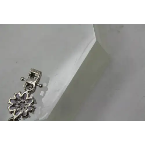 STS CHUCK CLEMENCY .925 S.S. TANZANITE FLOWER INFINITY bracelet (3)