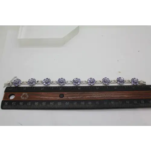 STS CHUCK CLEMENCY .925 S.S. TANZANITE FLOWER INFINITY bracelet (4)