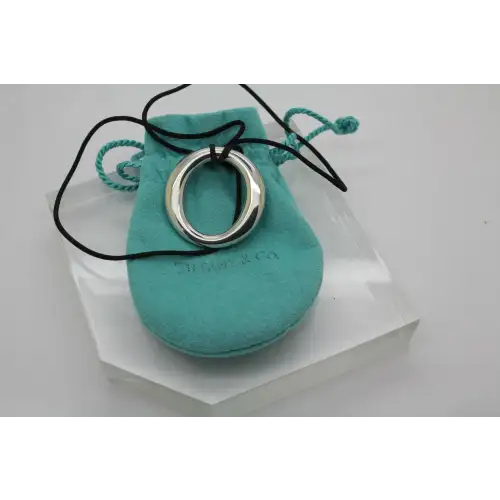 TIFFANY & CO .925 S.S. ELSA PERETTI SEVILLANA BLACK SILK CORD neck.